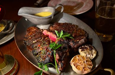 Bavette’s Steakhouse & Bar signature dishes Filet Mignon
Shrimp Scampi
Fried Chicken